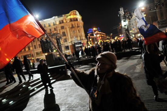 D. Medvedev and V. Putin appear at a rally on Manezh Square