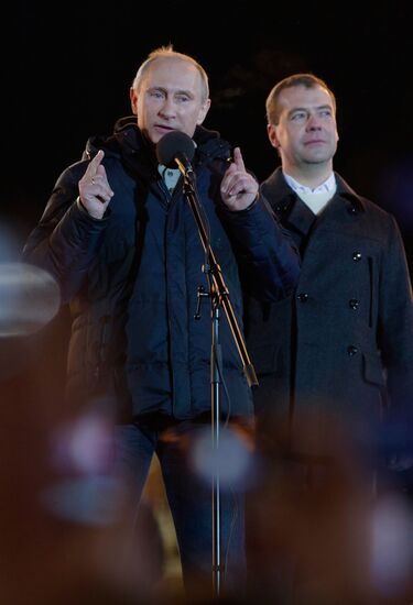 D. Medvedev and V. Putin appear at a rally on Manezh Square