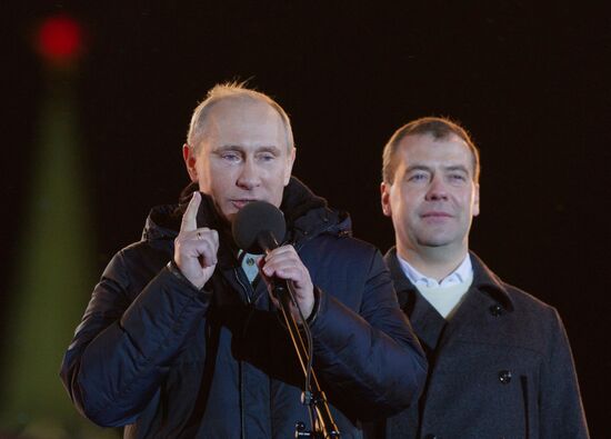 D. Medvedev and V. Putin appear at a rally on Manezh Square