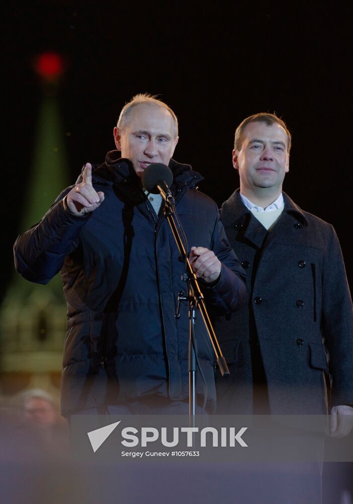 D. Medvedev and V. Putin appear at a rally on Manezh Square