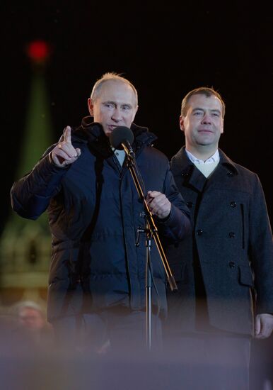 D. Medvedev and V. Putin appear at a rally on Manezh Square