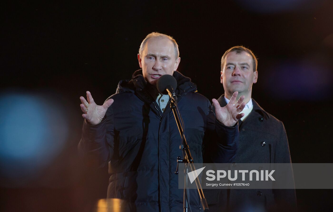 D. Medvedev and V. Putin appear at a rally on Manezh Square
