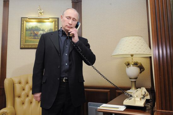 Presidential candidate V. Putin visits his election headquarters