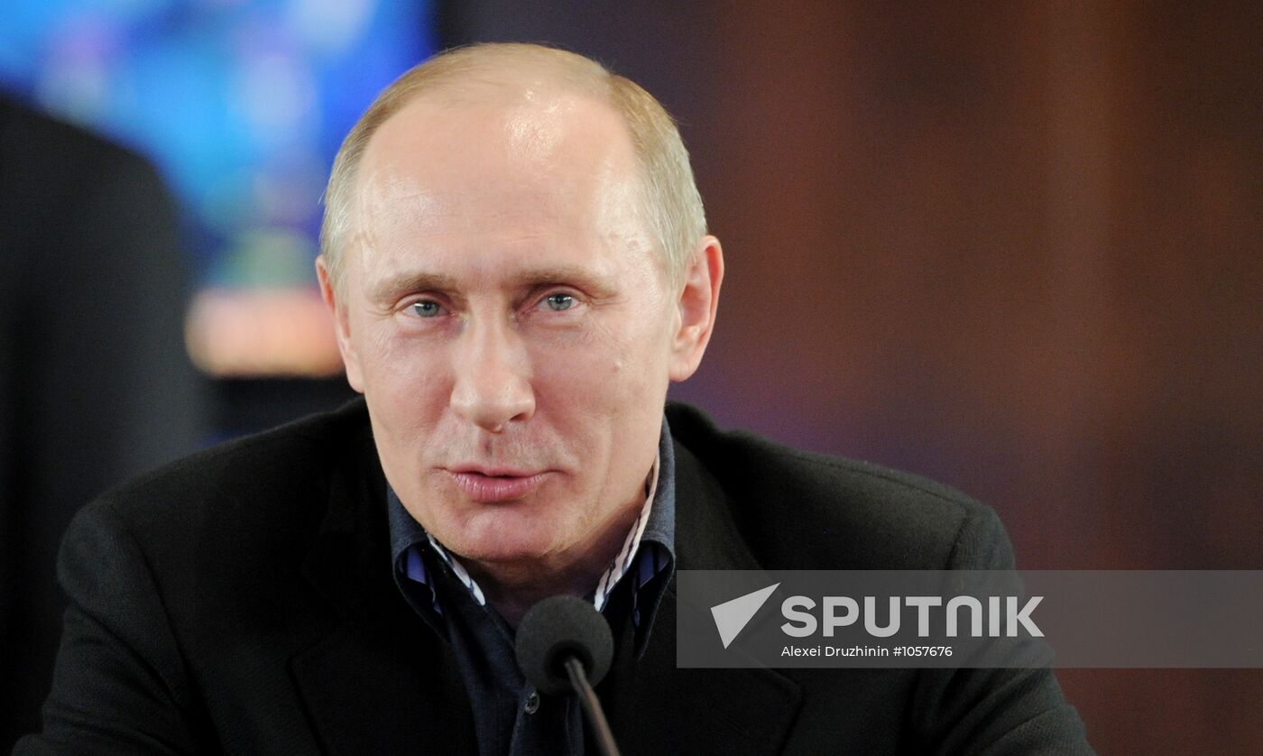 Presidential candidate V. Putin visits campaign headquarters