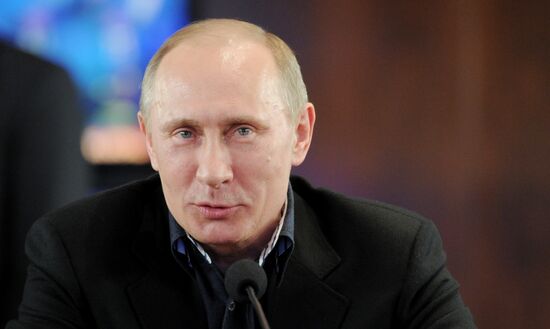 Presidential candidate V. Putin visits campaign headquarters