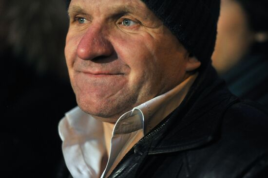 Faces of people rallying on Pushkin Square in Moscow