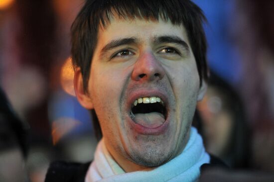 Man at "For Fair Elections" rally on Pushkin Square in Moscow