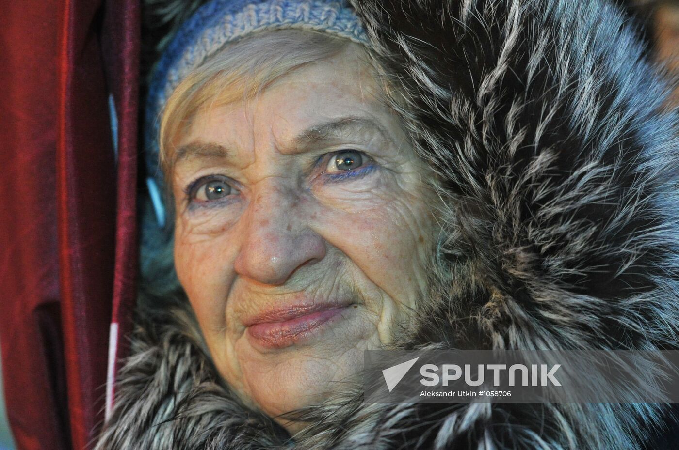 Faces of people rallying on Pushkin Square in Moscow