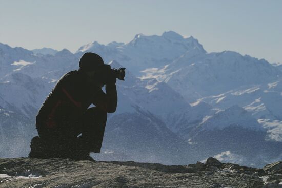 Photographer in Swiss Alps