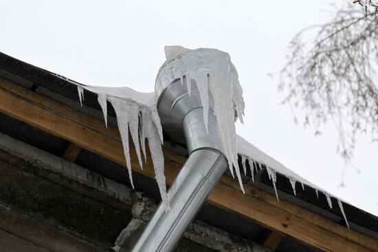 Clearing roofs of snow and ice