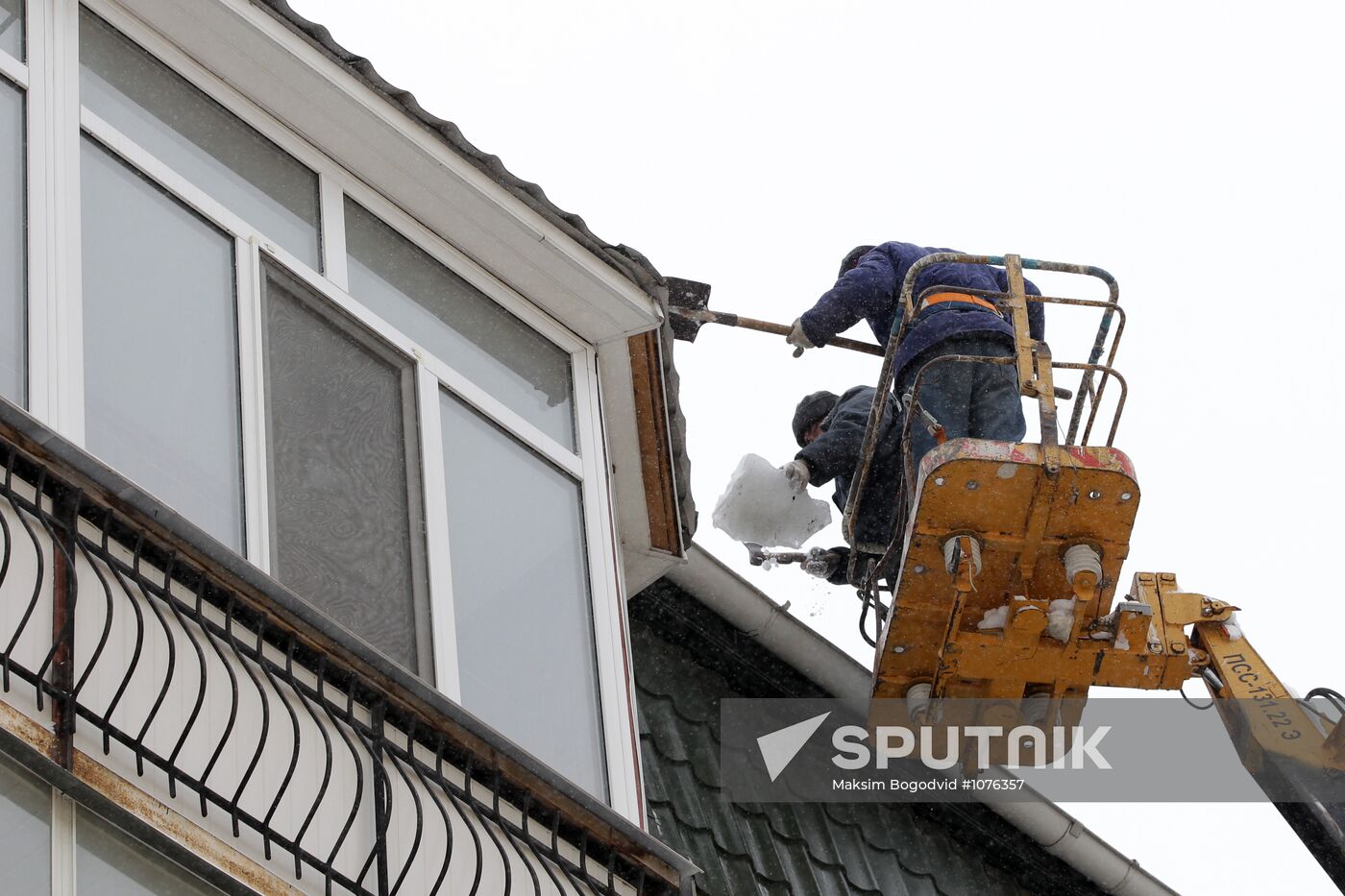 Clearing roofs of snow and ice