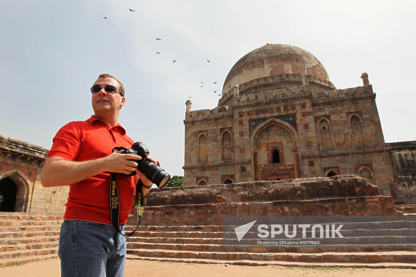 Dmitry Medvedev takes walk around New Delhi
