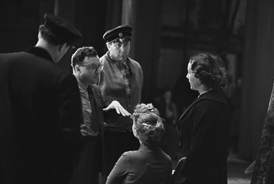 Director Iosif Raevsky with actors