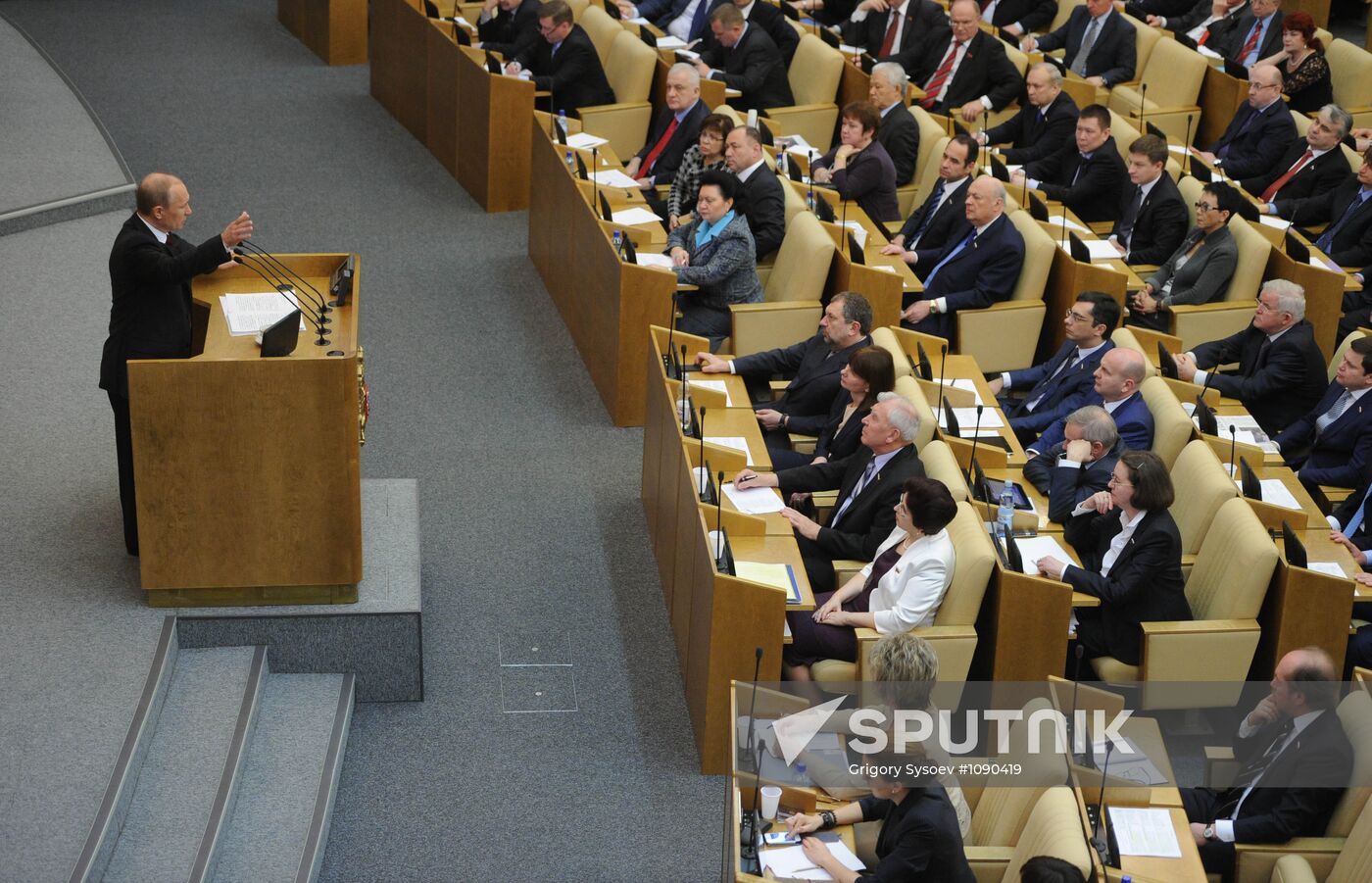 Vladimir Putin addresses lower house of Russian parliament