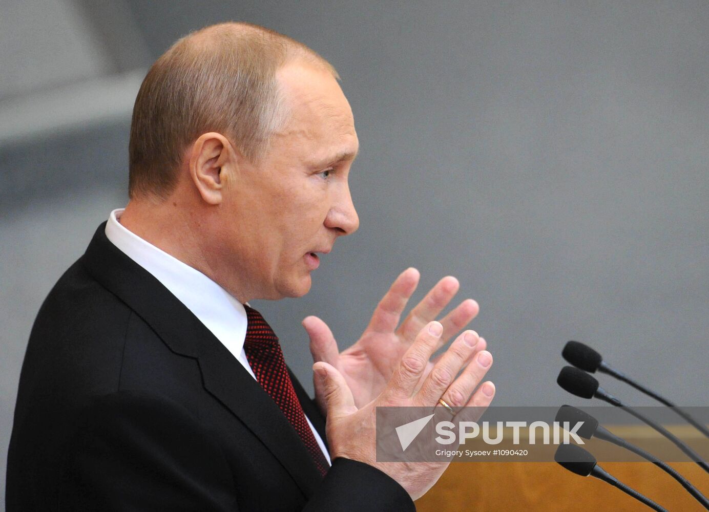 Vladimir Putin addresses lower house of Russian parliament