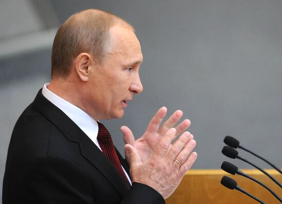 Vladimir Putin addresses lower house of Russian parliament