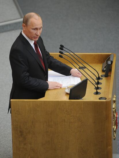 Vladimir Putin addresses lower house of Russian parliament