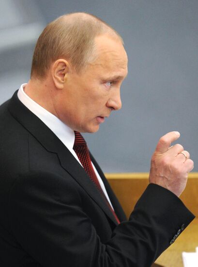 Vladimir Putin addresses lower house of Russian parliament