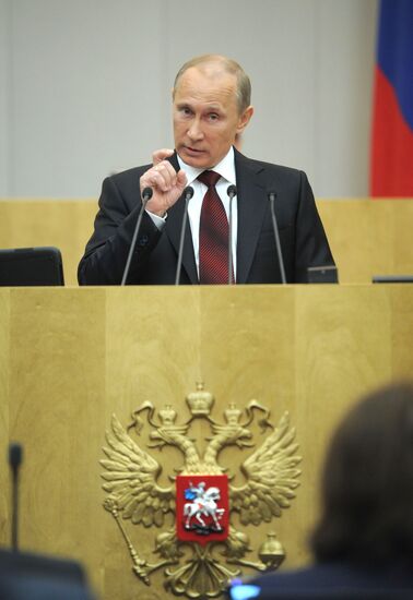 Vladimir Putin addresses lower house of Russian parliament