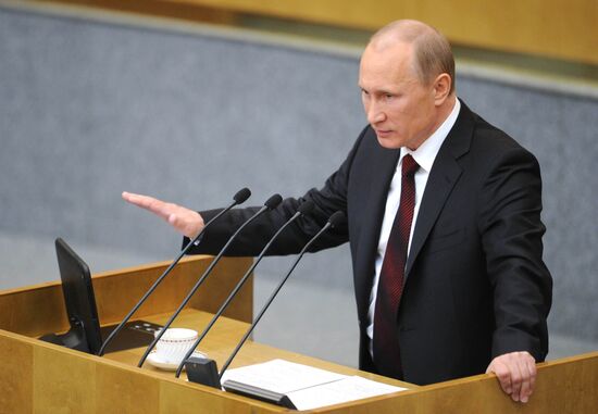Vladimir Putin addresses lower house of Russian parliament