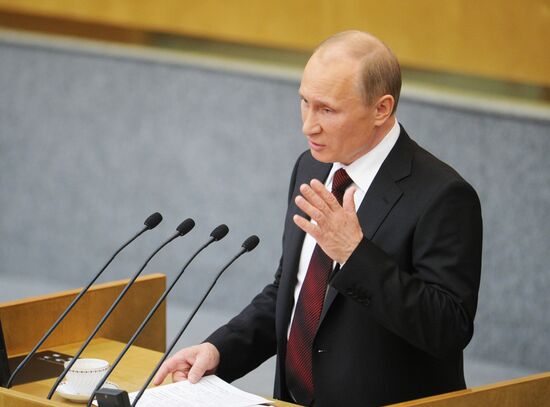 Vladimir Putin addresses lower house of Russian parliament