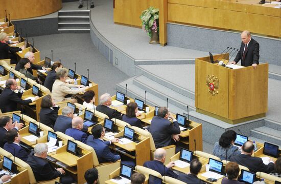 Vladimir Putin addresses lower house of Russian parliament