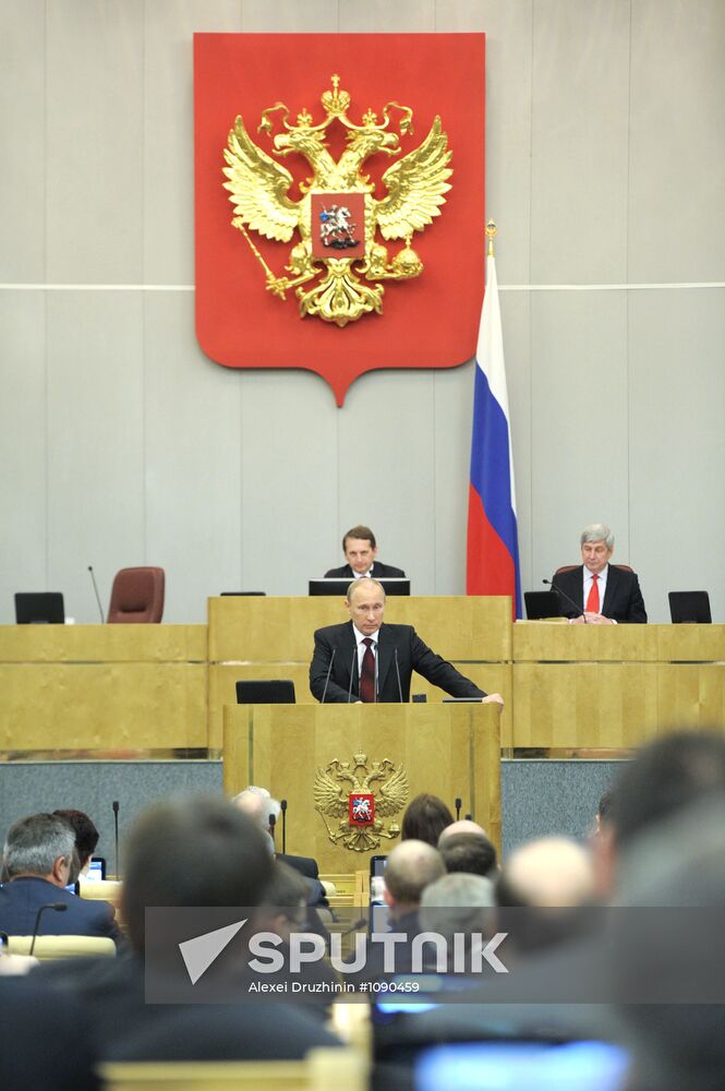 Vladimir Putin addresses lower house of Russian parliament