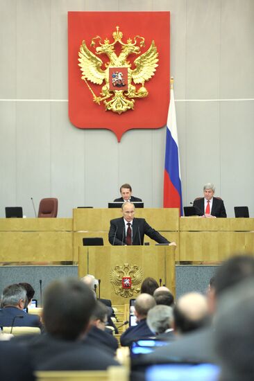 Vladimir Putin addresses lower house of Russian parliament