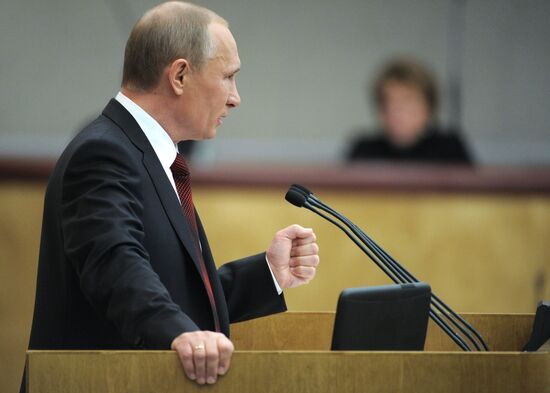 Vladimir Putin addresses lower house of Russian parliament