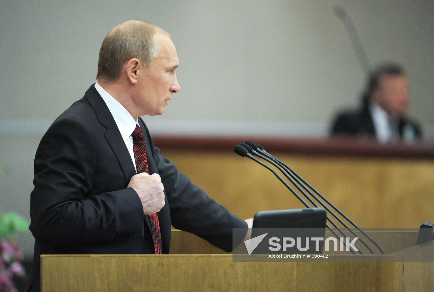 Vladimir Putin addresses lower house of Russian parliament