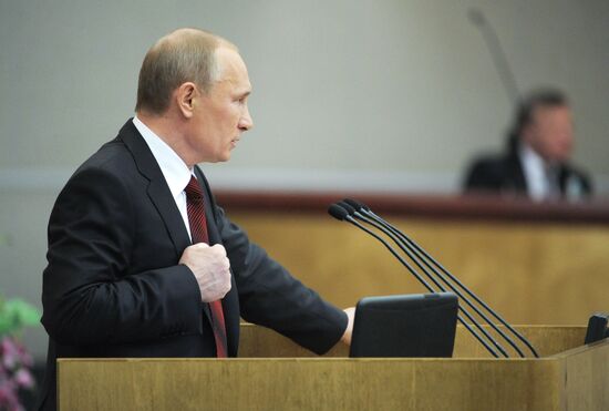Vladimir Putin addresses lower house of Russian parliament