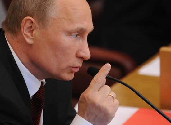 Vladimir Putin addresses lower house of Russian parliament