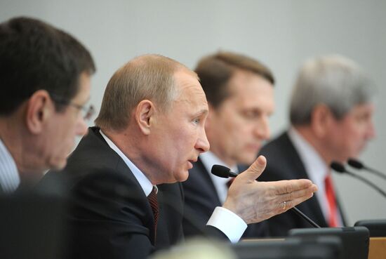 Vladimir Putin addresses lower house of Russian parliament