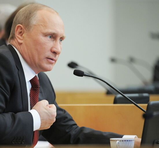 Vladimir Putin addresses lower house of Russian parliament