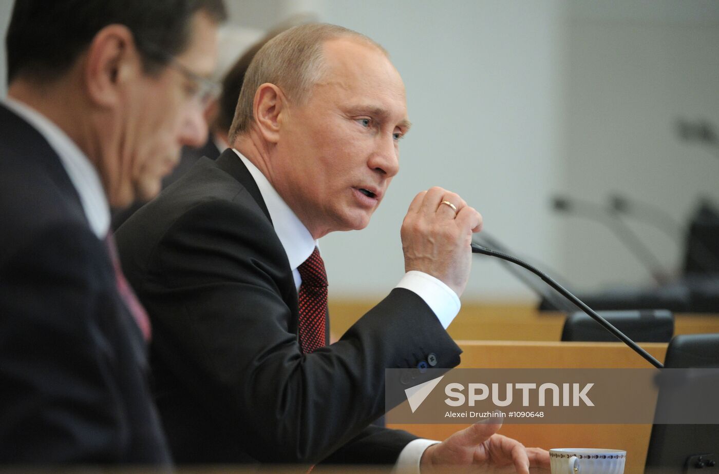 Vladimir Putin addresses lower house of Russian parliament