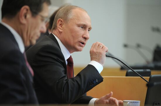 Vladimir Putin addresses lower house of Russian parliament