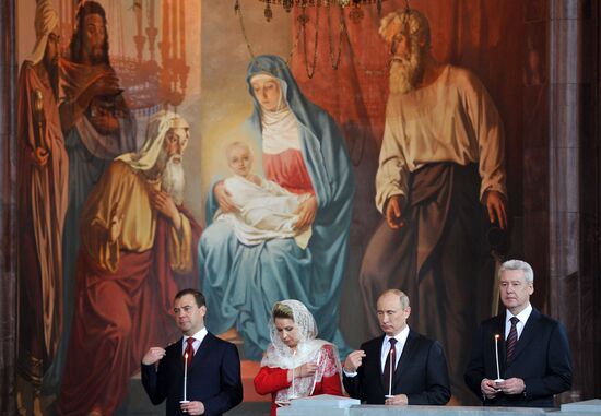 Medvedev and Putin at Christ the Savior Cathedral in Moscow