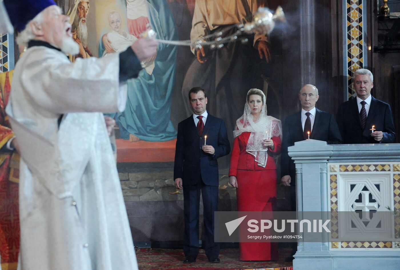 Medvedev and Putin at Christ the Savior Cathedral in Moscow