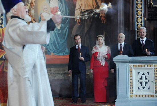 Medvedev and Putin at Christ the Savior Cathedral in Moscow