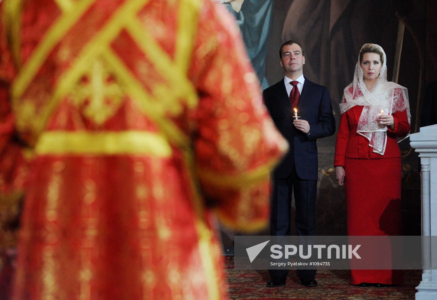 Medvedev and Putin at Christ the Savior Cathedral in Moscow