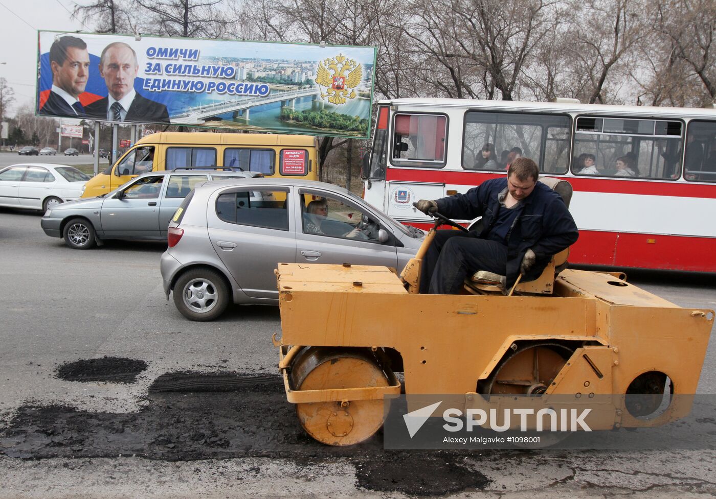 Repairing roads in Omsk