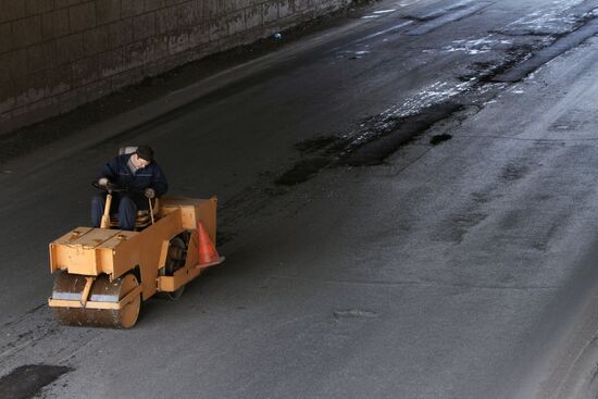 Repairing roads in Omsk
