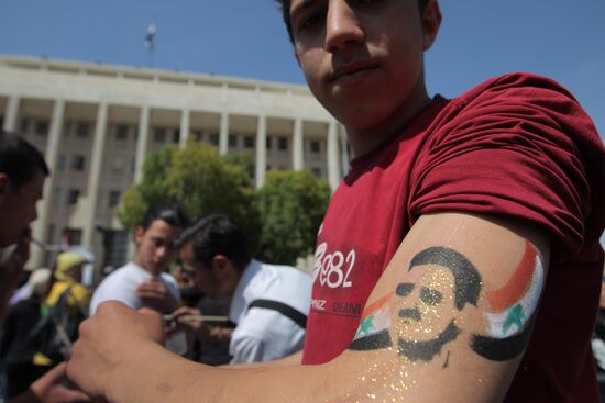 Rally to support President Bashar al-Asad in Damask