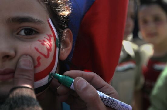 Rally to support President Bashar al-Asad in Damask