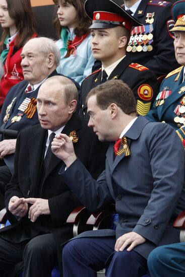 Vladimir Putin and Dmitry Medvedev attend Victory Day parade