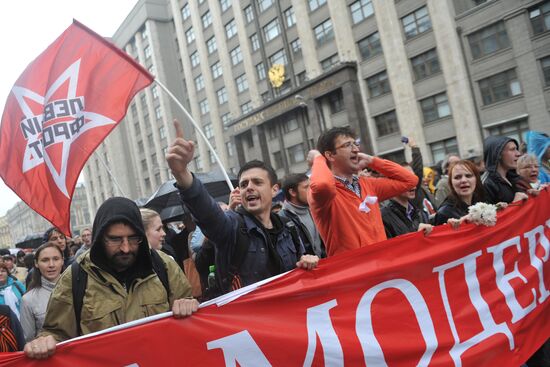 Opposition demonstrators march on Tverskaya street in Moscow