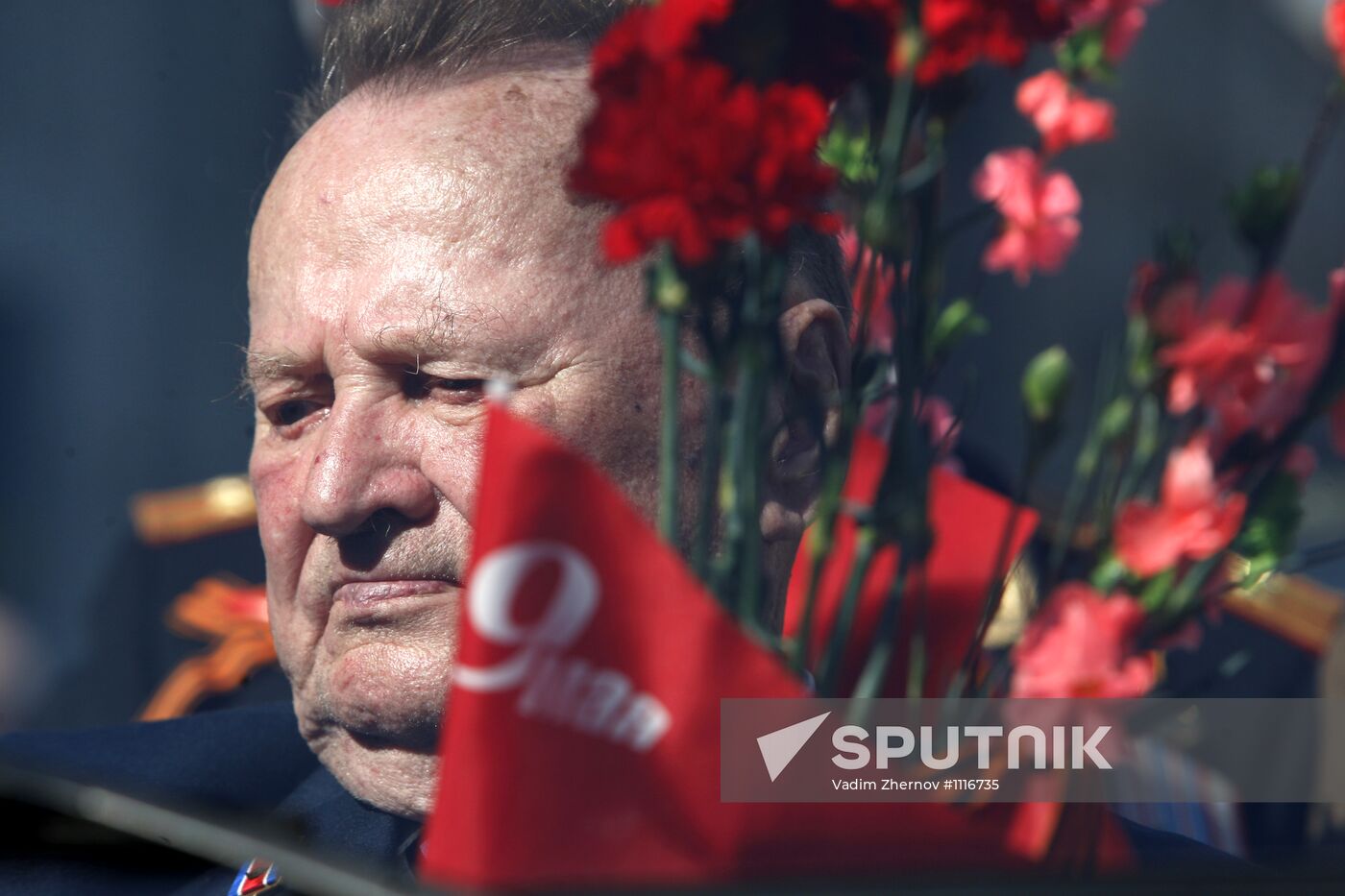 War veterans march along Nevsky Avenue