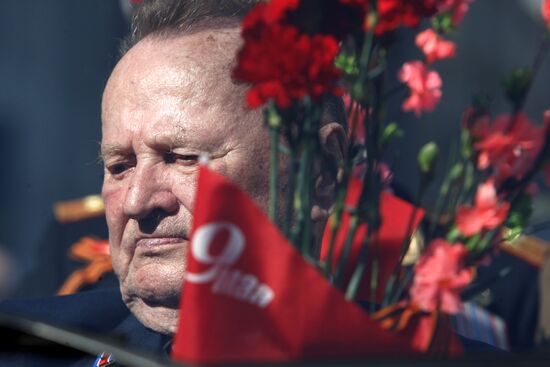 War veterans march along Nevsky Avenue