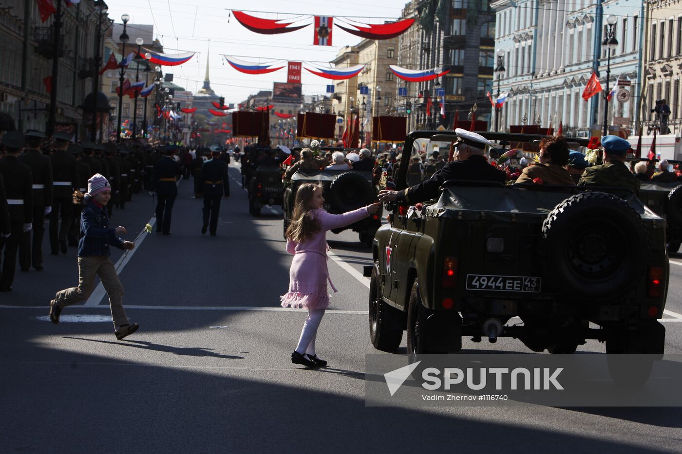 War veterans march along Nevsky Avenue