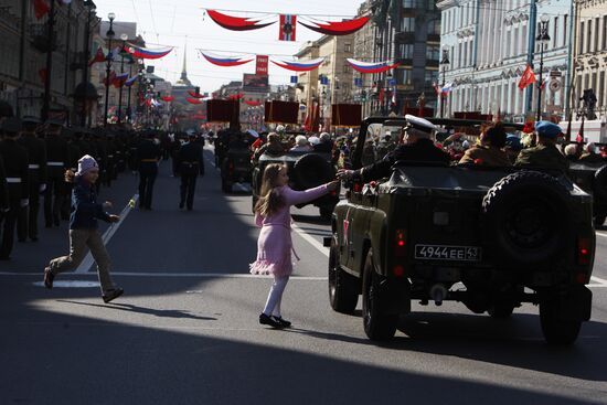 War veterans march along Nevsky Avenue